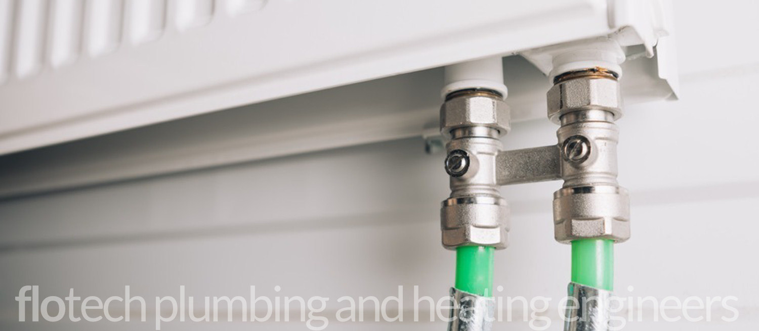 Power flushing a central heating radiator in Milford Haven